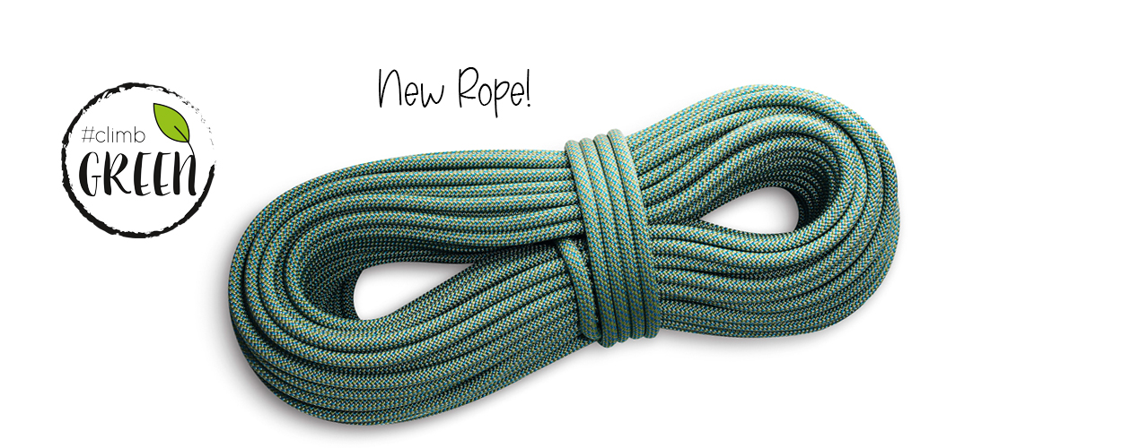 コイル状に巻いた緑と青のロープ。New Rope!と#climb GREENの文字がある。